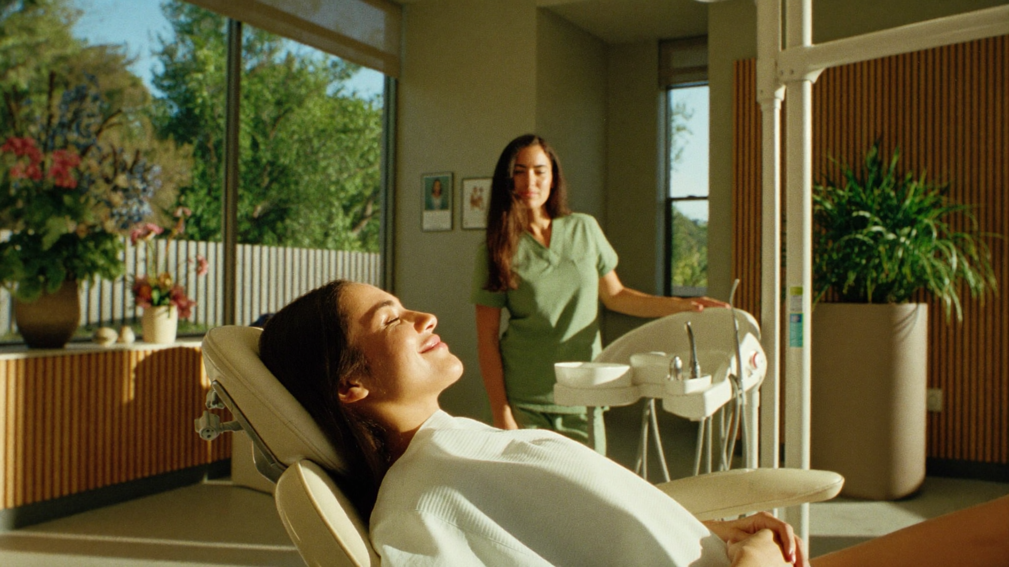 Relaxed patient in a dental chair bathed in golden afternoon light at Smiles4Life in Thousand Oaks, CA